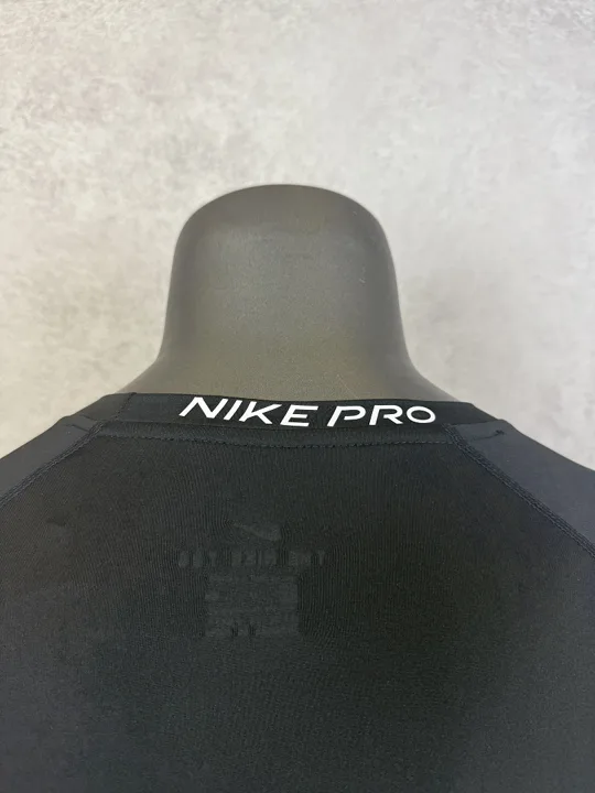 View 4 of Black Short Sleeve Compression Shirt · Style 010
