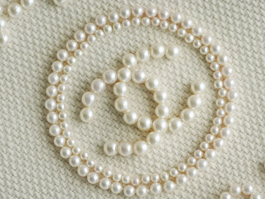 View 5 of CHANEL TOTE BAG 39 ATTACHED PEARL LOGO IN BEIGE CANVAS GOLD HARDWARE