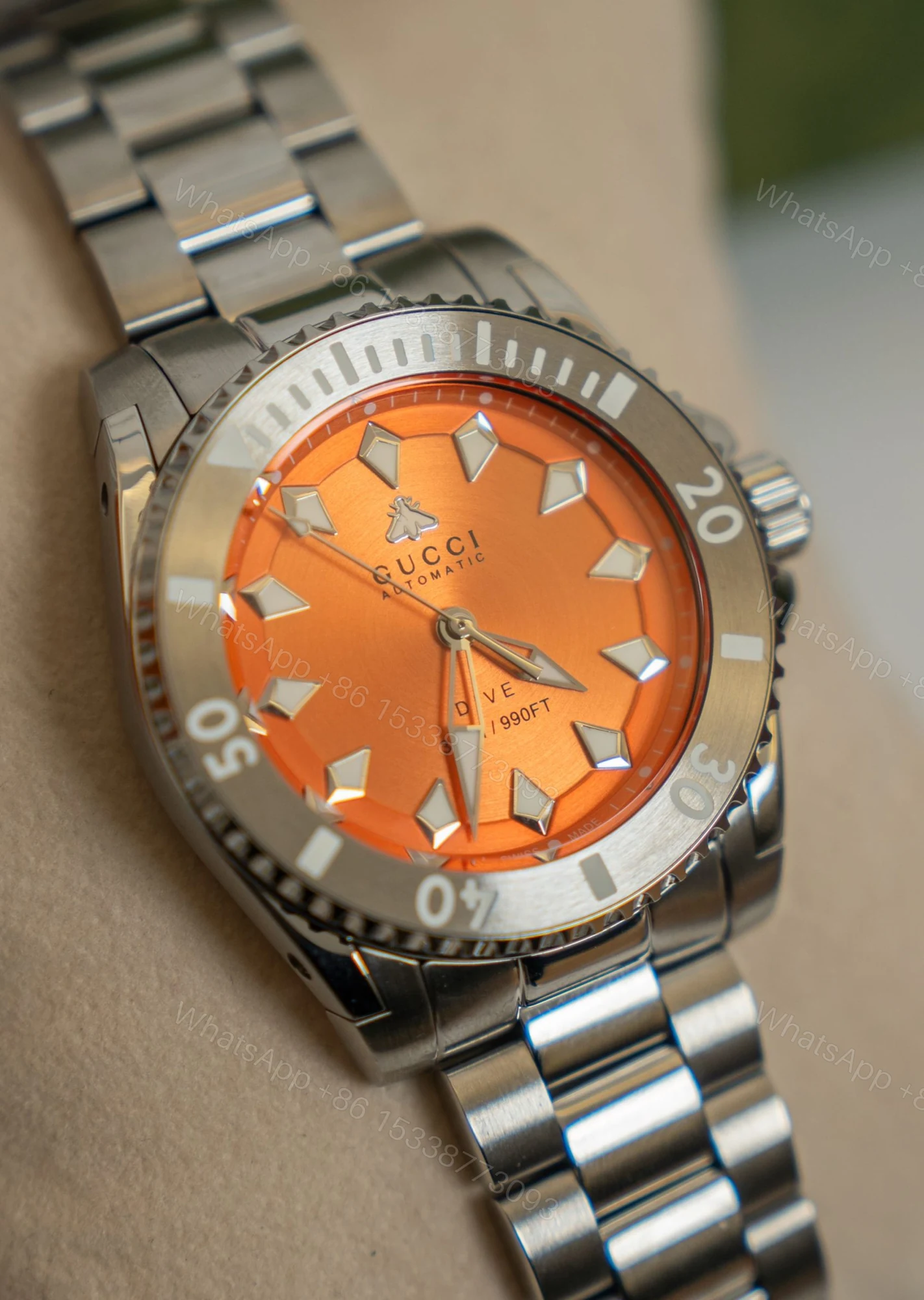 Gucci Dive 橙色放射紋表盤精鋼腕錶 自動機械潛水款 — view 1