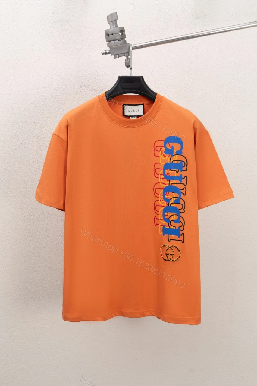 Gucci高仿橘色T恤 直條彩字設計點綴圓形GG標LOGO — view 1