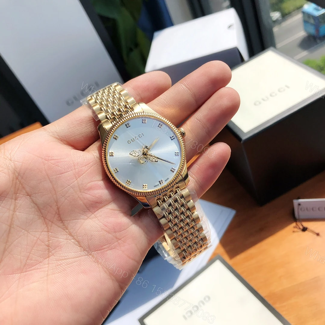 Gucci原單女錶Timeless金鍊款 蜜蜂圖騰母貝錶面典雅風 — view 1