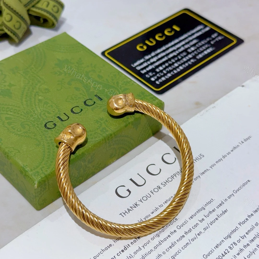 Gucci高仿金色骷髏雙頭手環 捲線雕刻設計金屬質感強烈 — view 1