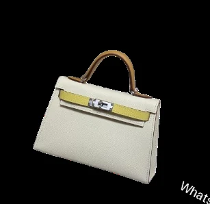 Hermes Kelly top-handle bag in ivory and yellow — view 1