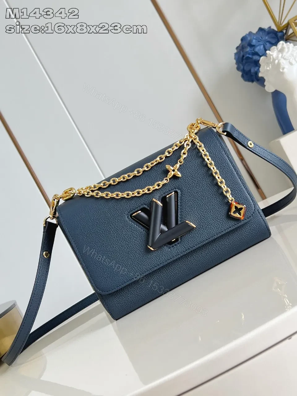 Blue Pebbled Leather Crossbody with Gold Hardware Signature Accent — view 1