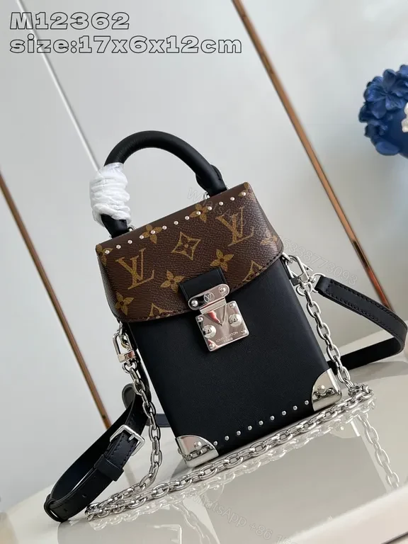 Black + Coated Canvas + Crossbody + Signature Monogram Detailing + Compact Luxury Bag — view 1