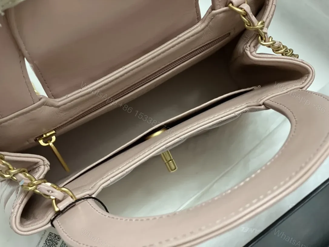 View 8 of Soft Pink Quilted Mini Bag with Gold Chain Handle - Everyday Luxe