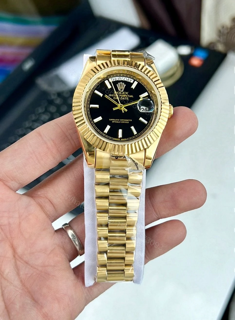 Rolex Day-Date 40 Evergreen Gold Black Dial 7AA — view 1