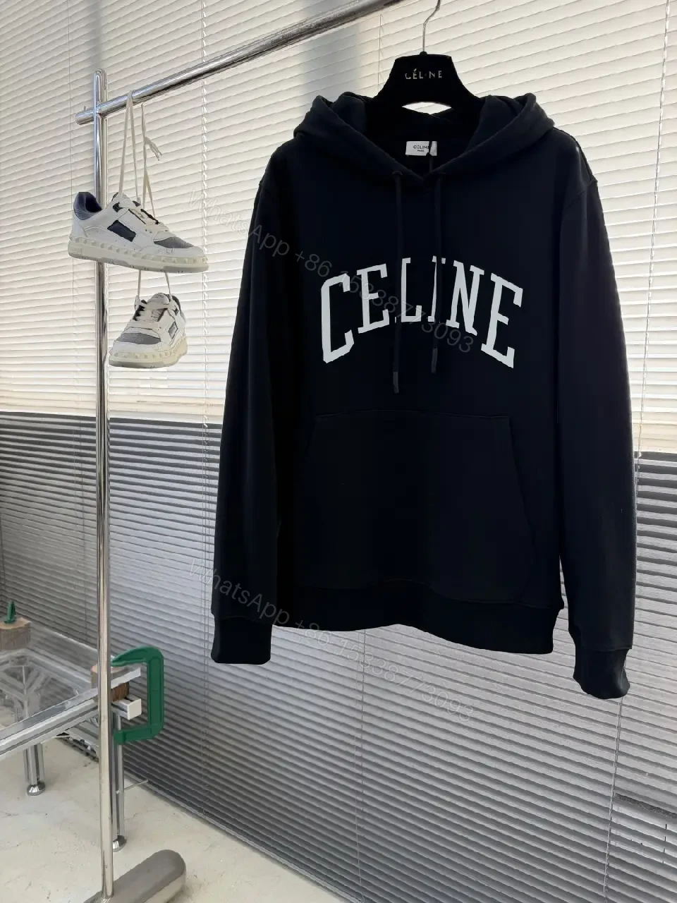 Minimalist Logo Hoodie: Black Knit, Relaxed Streetwear Comfort — view 1