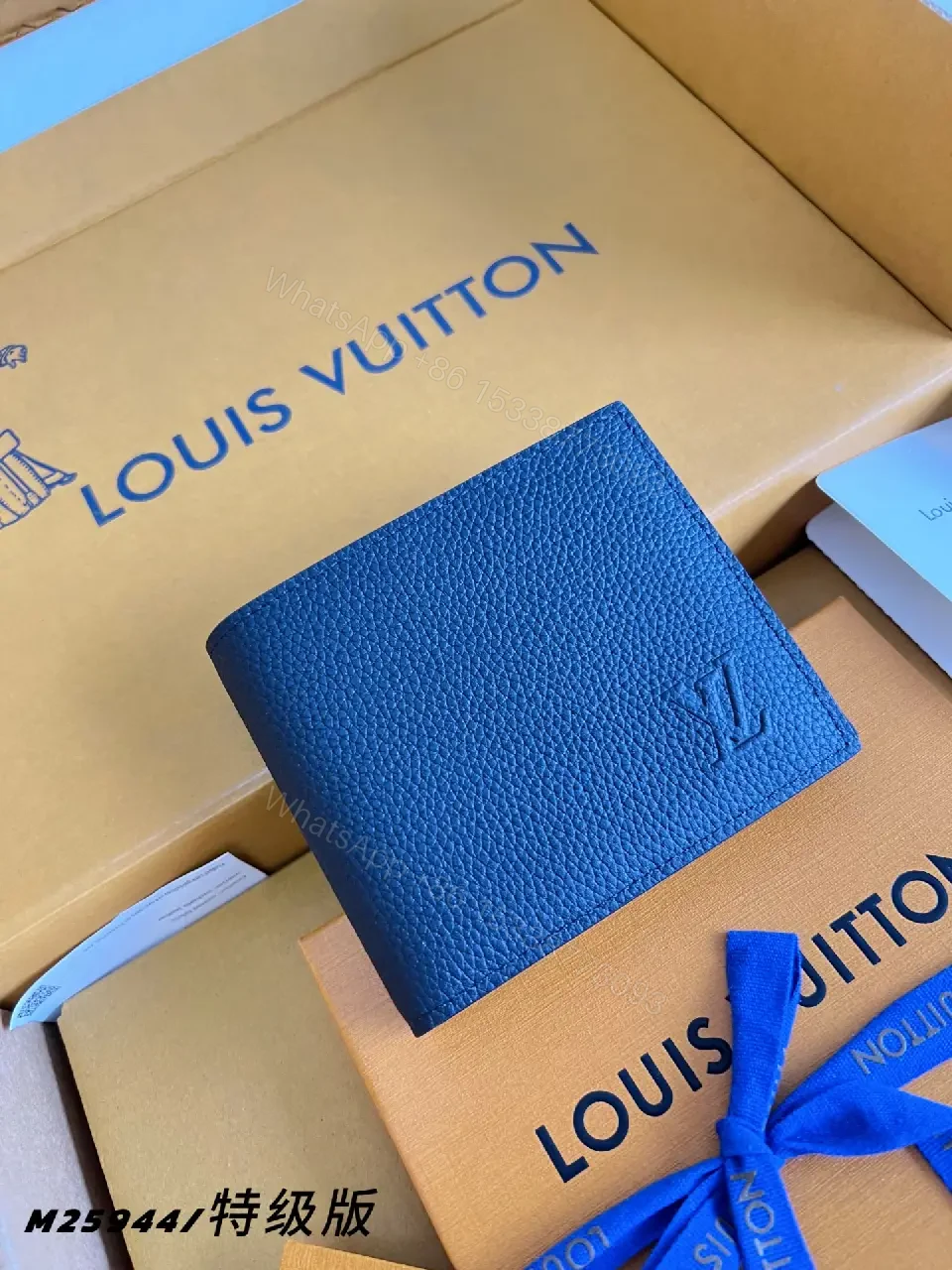 View 7 of Bright Louis Vuitton Orange Boxed Wallet Set with Navy Pebbled Wallet