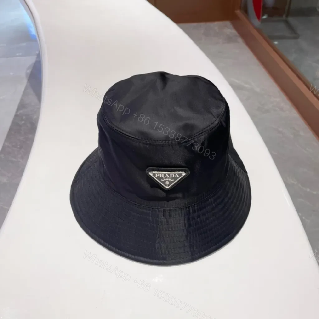 Compact Luxury Bucket Hat with Designer Emblem — view 1