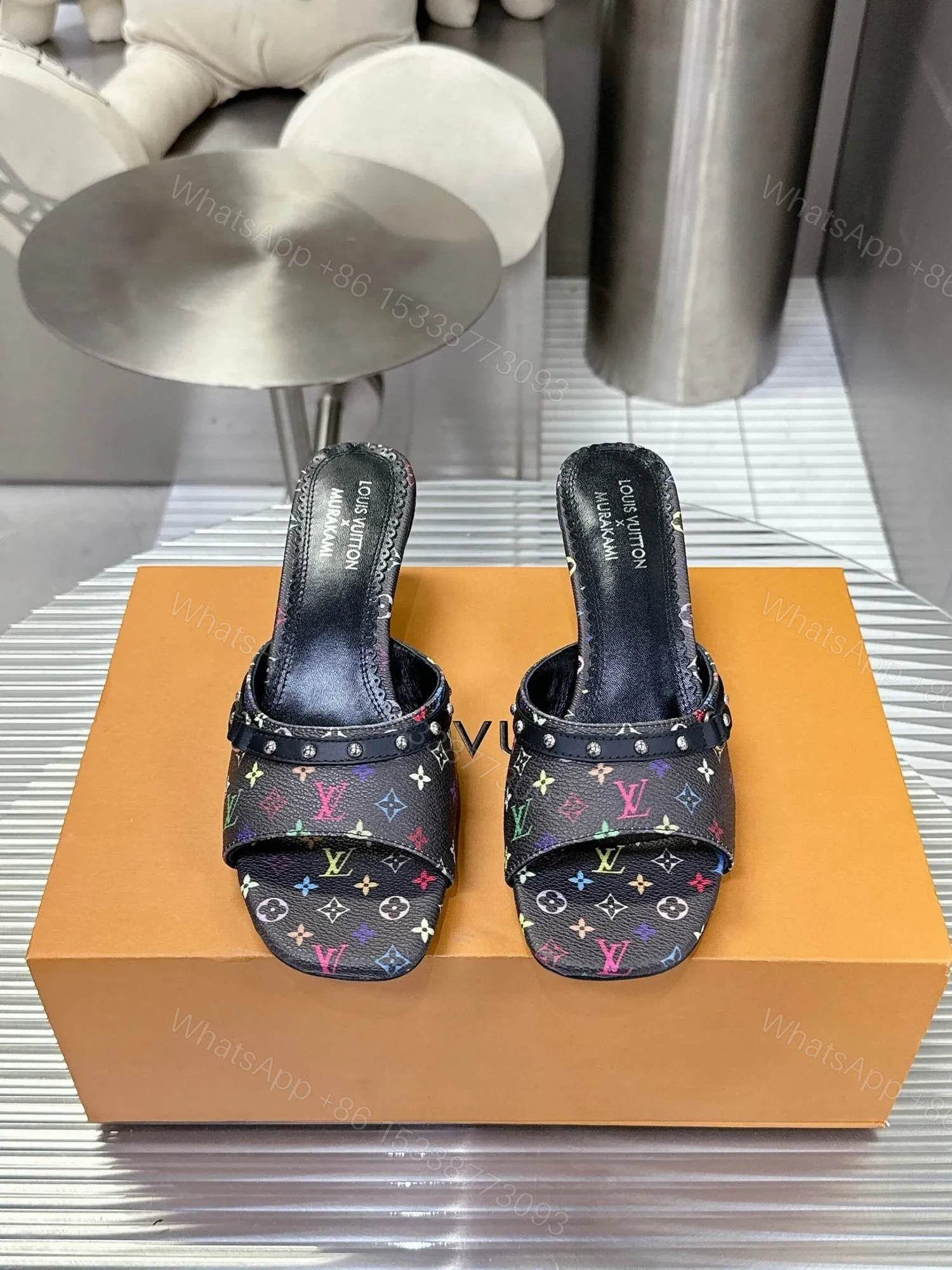 LV Women Black Patterned Leather Mules — view 1