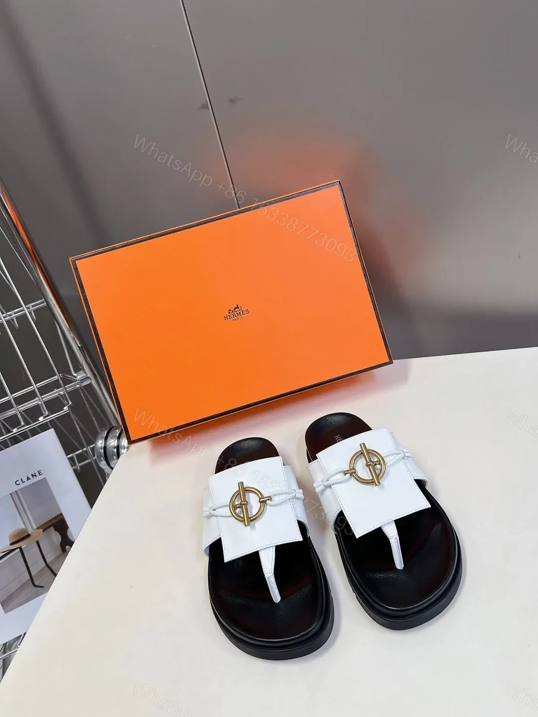 Hermes Women White Leather Black Sole Sandals — view 1