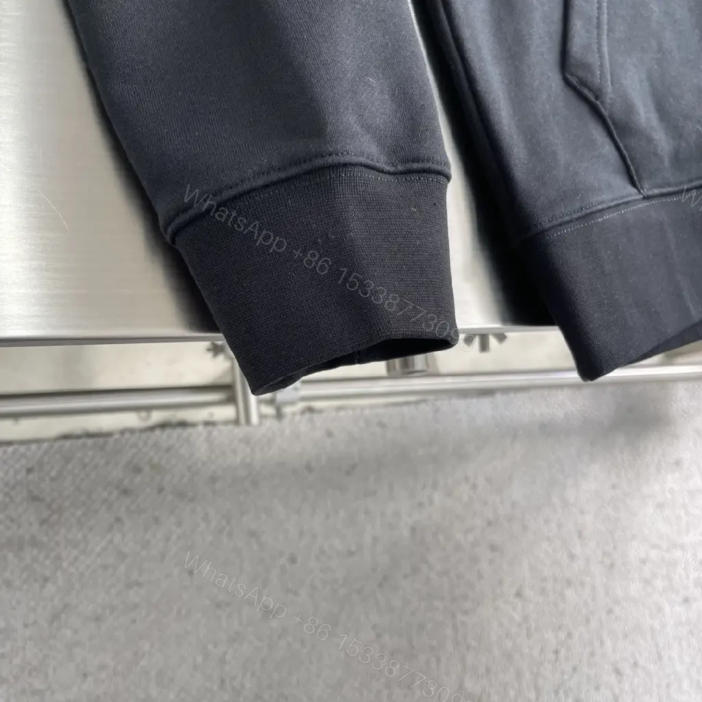 View 5 of Minimalist Logo Hoodie: Black Knit, Relaxed Streetwear Comfort