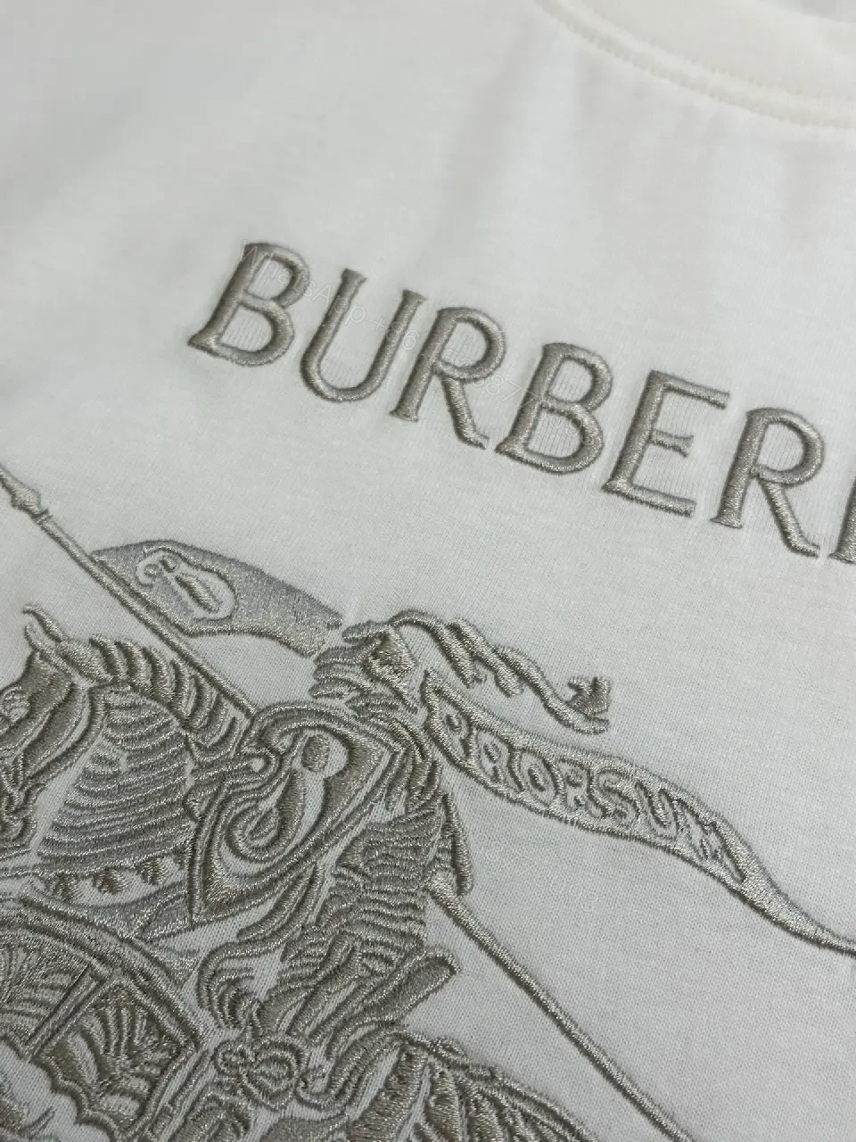 View 6 of Minimalist White Tee with Iconic Horse Motif, Premium Cotton