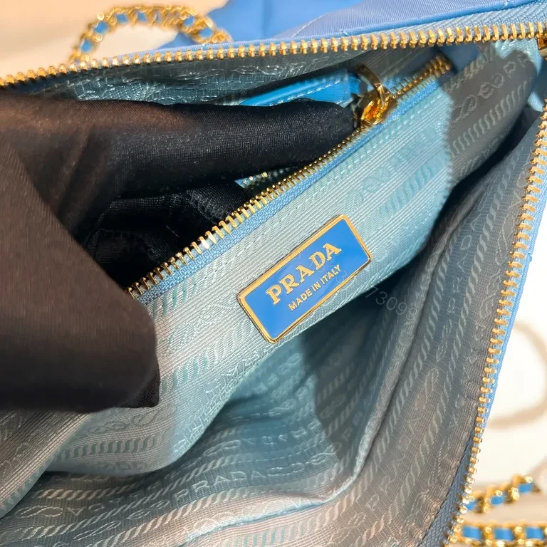 View 6 of Sky-Blue Quilted Nylon Shoulder Bag with Gold Chain - Luxury Prada-Style
