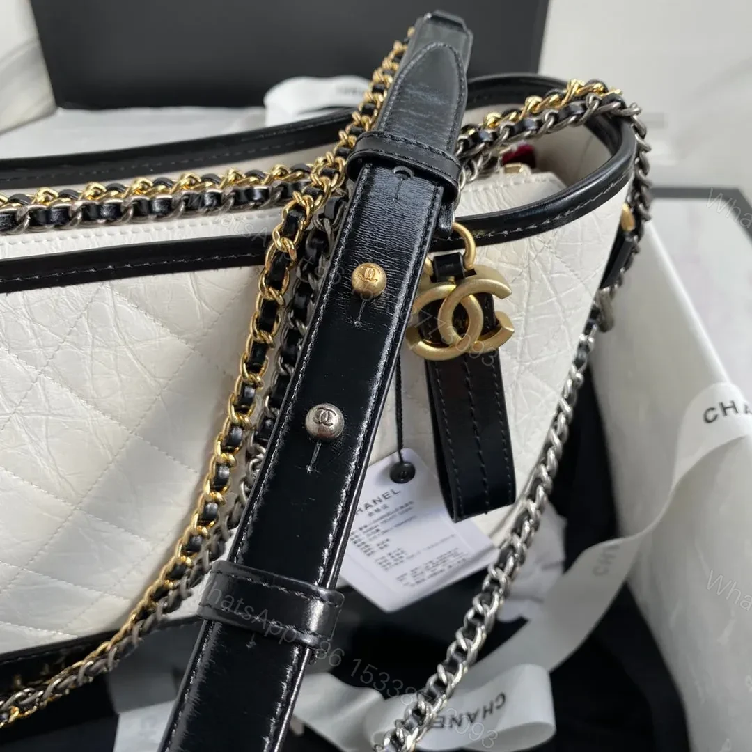 View 5 of CHANEL GABRIELLE MEDIUM 28 HOBO BAG IN BLACK MIX WHITE CALFSKIN