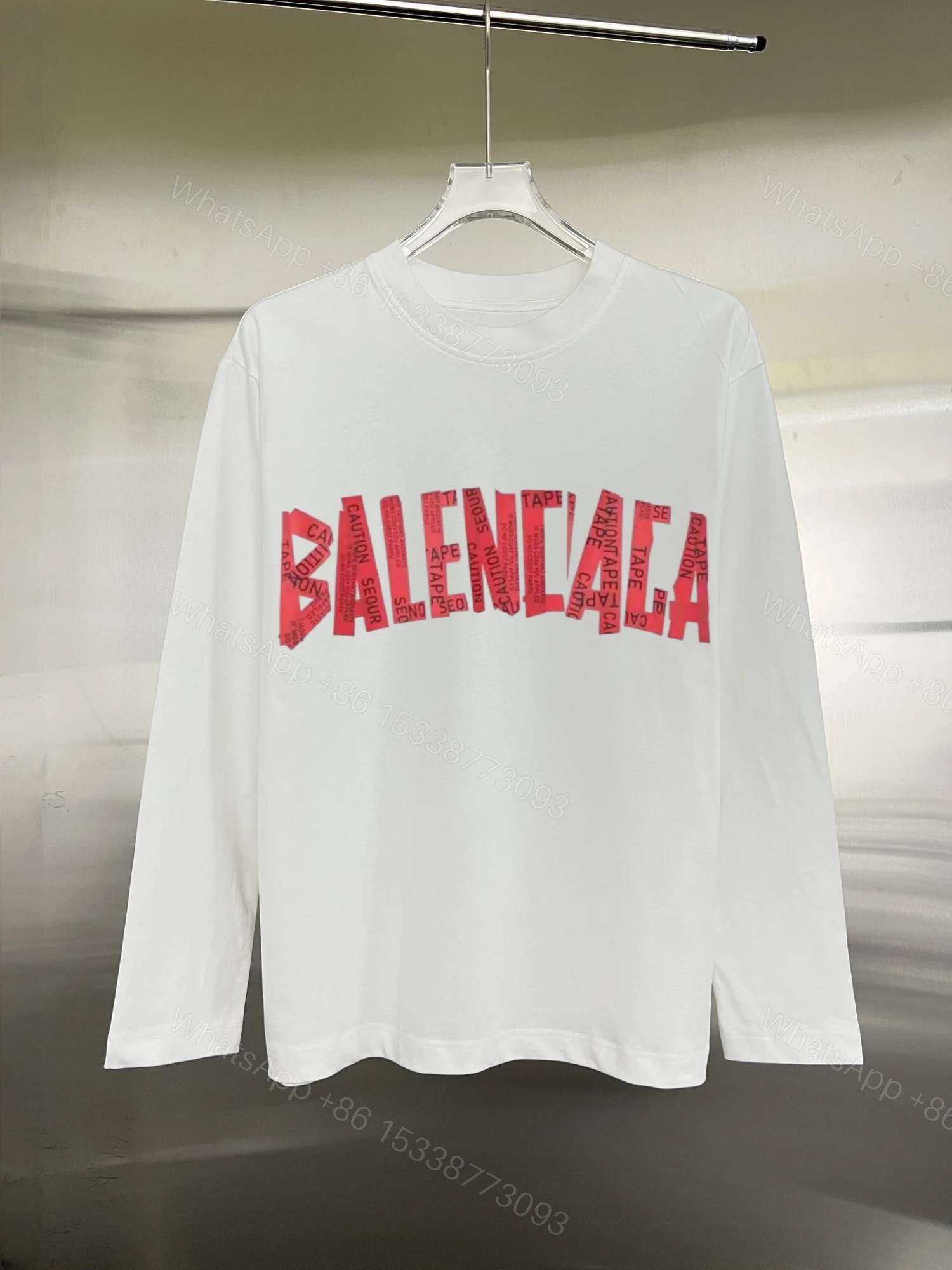 Balenciaga高仿白色長袖T 男款紅字膠帶字樣 潮流風格必備款 — view 1