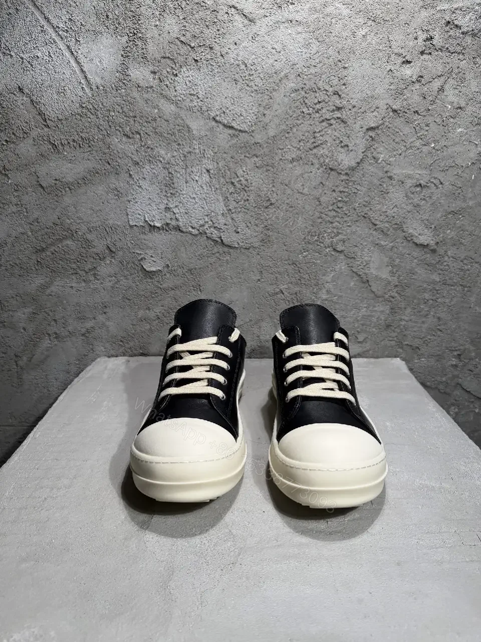 View 9 of Black Leather Casual Sneakers with White Toe Cap and Stud Details