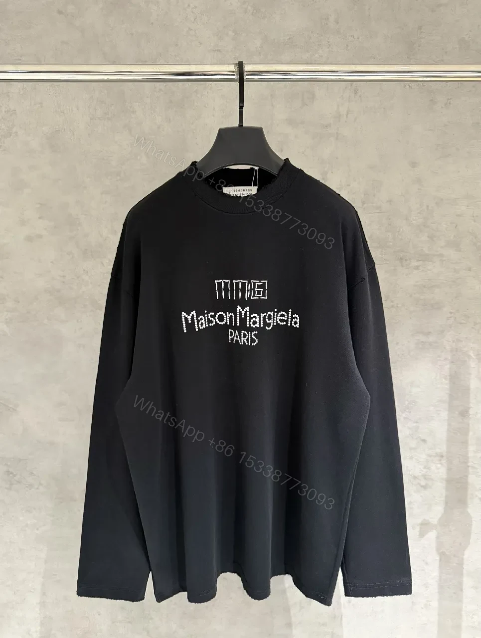 Relaxed Black Sweatshirt with White Embroidery — view 1