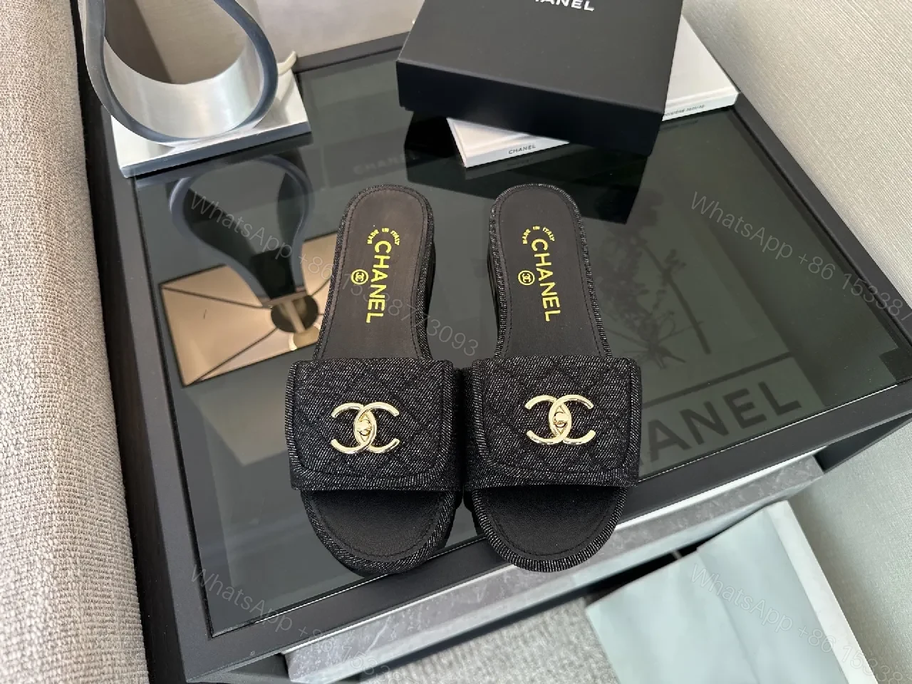 Chic Denim Slip-Ons with Gold Interlock Hardware — view 1