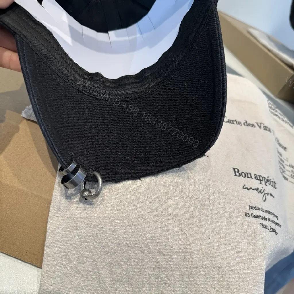 View 8 of Dark Textured Cap with Subtle Designer Badge, Everyday Luxury