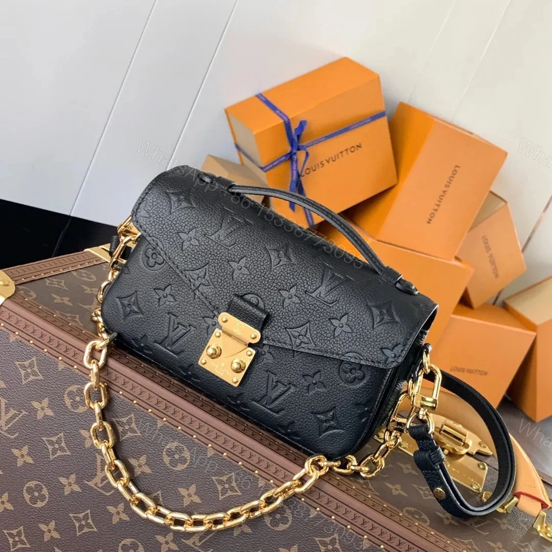 Louis Vuitton Pochette Métis Monogram Empreinte Leather — view 1