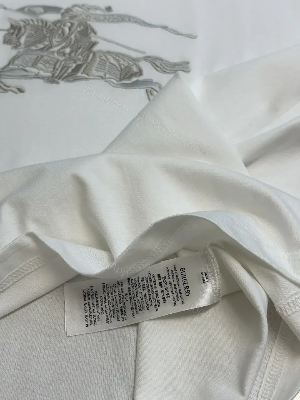 View 10 of Minimalist White Tee with Iconic Horse Motif, Premium Cotton