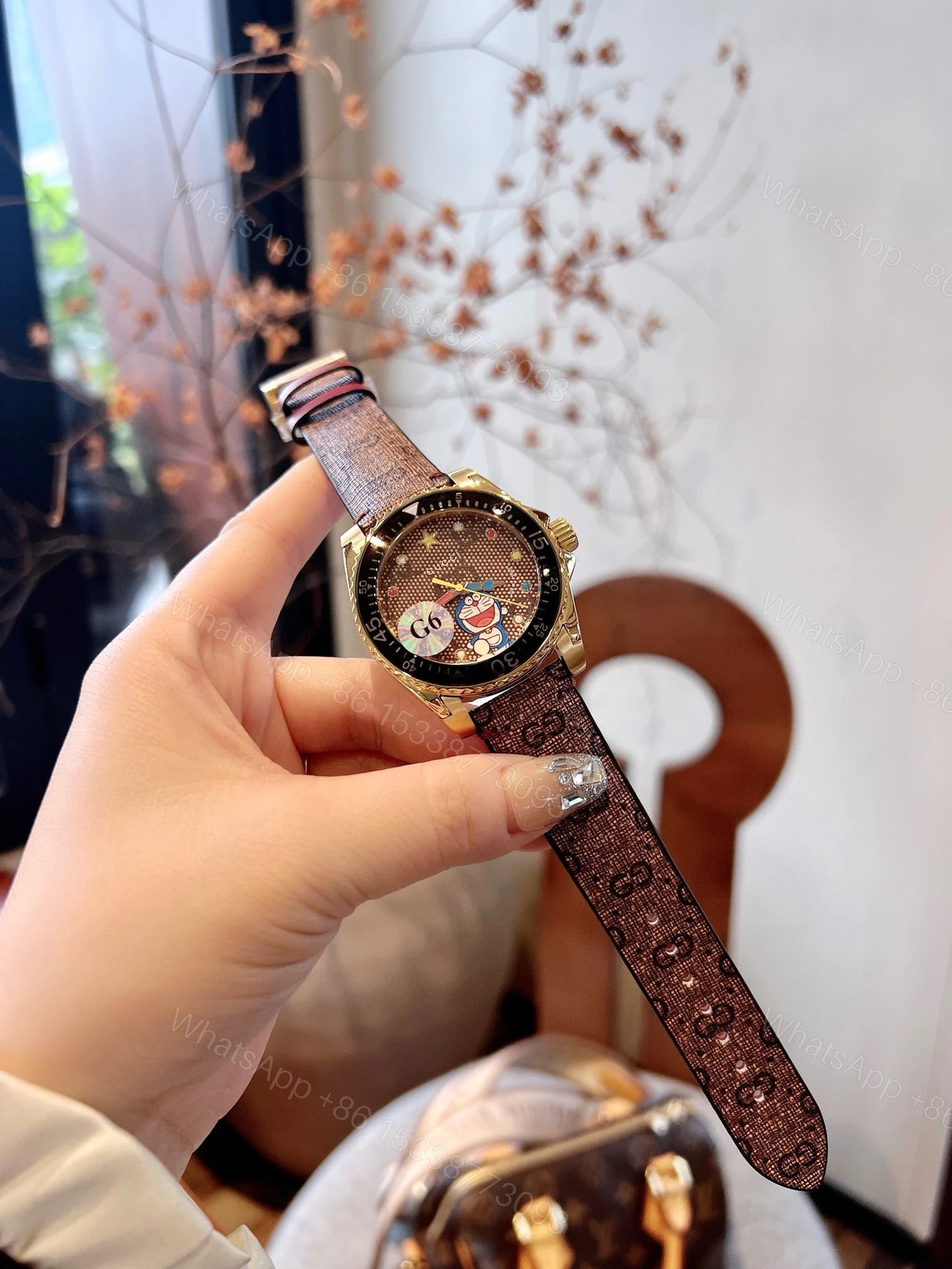 Gucci高仿潛水錶 GG老花錶帶 卡通印花金色表殼趣味款 — view 1