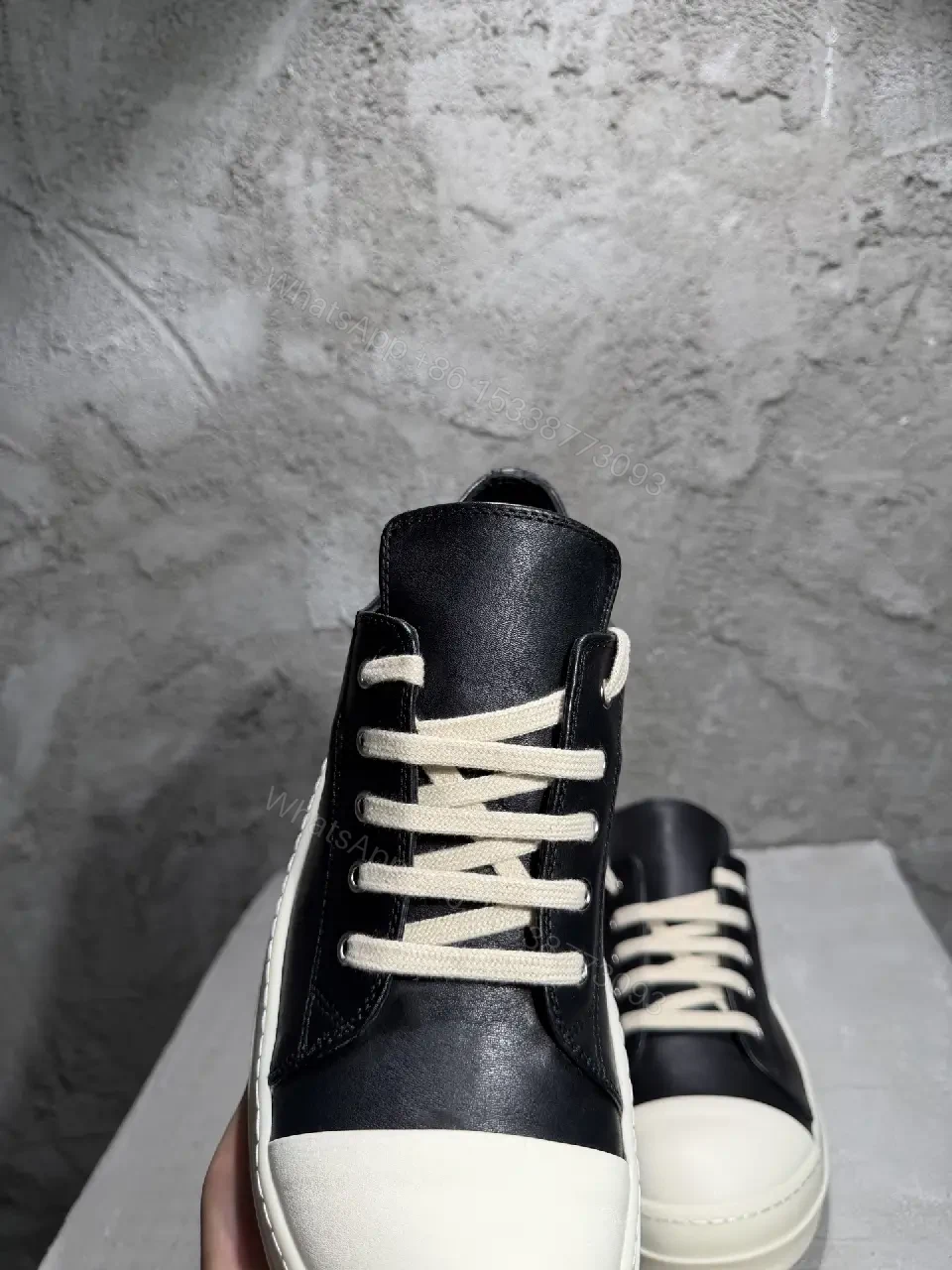 View 8 of Black Leather Casual Sneakers with White Toe Cap and Stud Details
