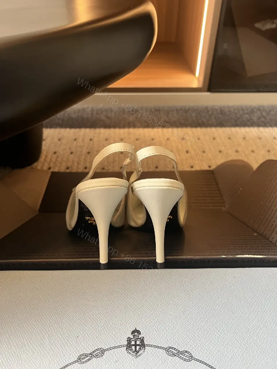 View 5 of White Leather Slingback Heels with Studded Bow – Classic Prada Style