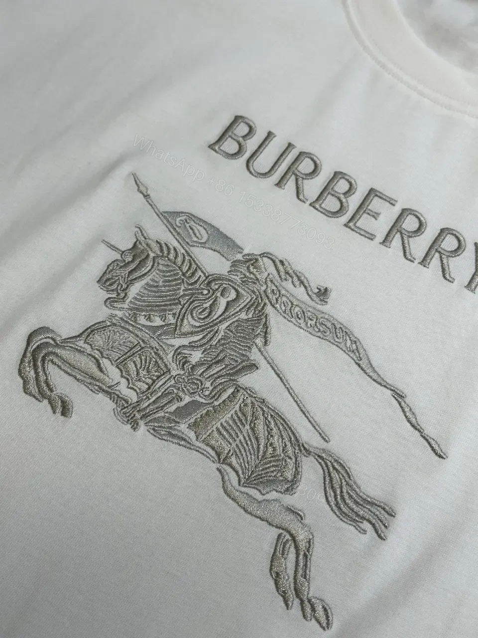 View 9 of Minimalist White Tee with Iconic Horse Motif, Premium Cotton