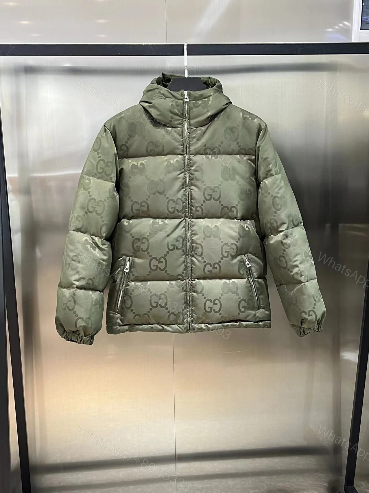 Gucci高仿羽絨外套綠色GG壓紋連帽簡約實用款 — view 1