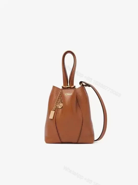 Chic Cognac Leather Bucket Bag - Luxurious Everyday Carry — view 1