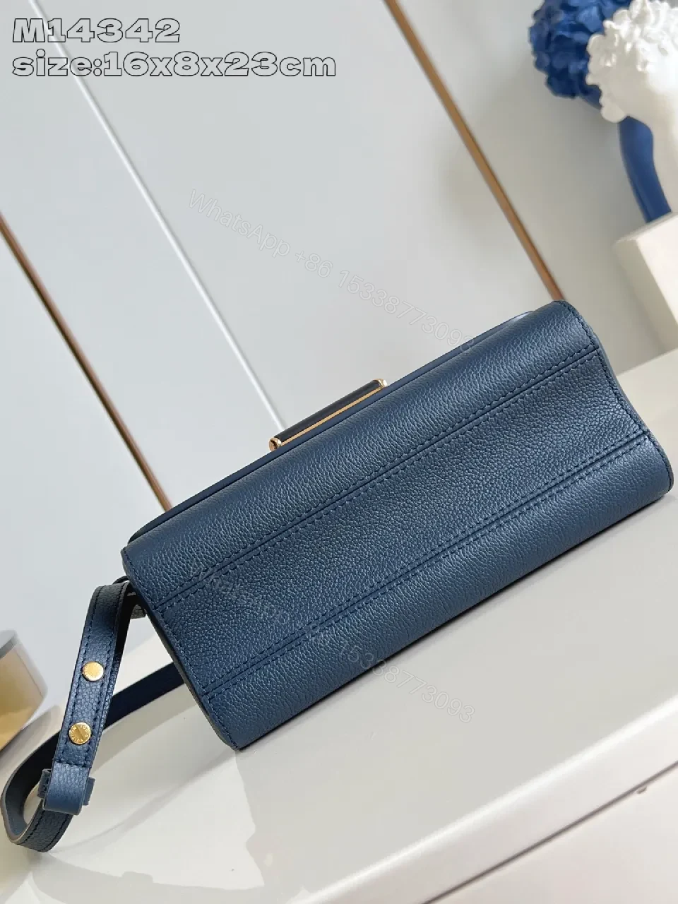View 5 of Blue Pebbled Leather Crossbody with Gold Hardware Signature Accent