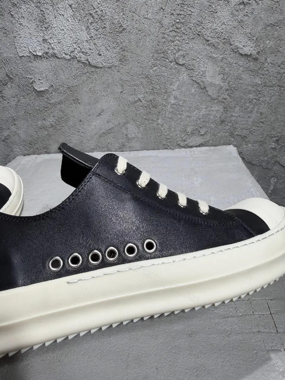View 7 of Black Leather Casual Sneakers with White Toe Cap and Stud Details