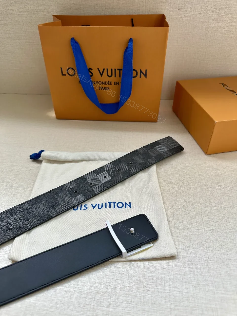 View 5 of Bold Checkered Belt with Gradient LV Buckle - Luxury Streetwear Belt