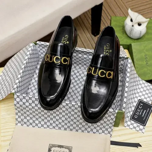 Gucci Black Leather Cara Logo Embellished Loafers — view 1