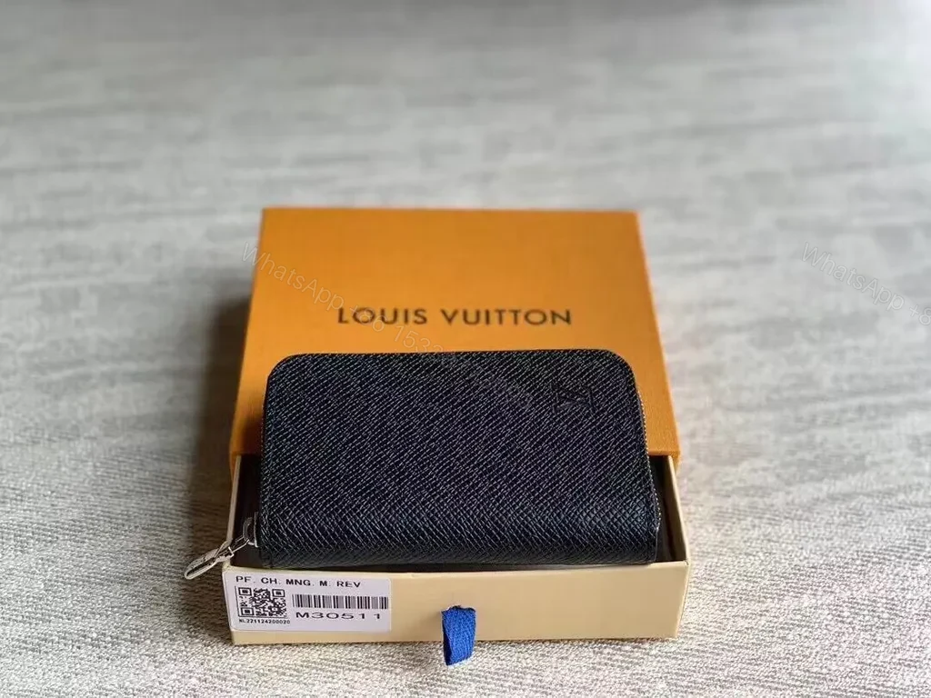 Louis Vuitton Compact Black Leather Zip Wallet — Slim, Secure Elegance — view 1