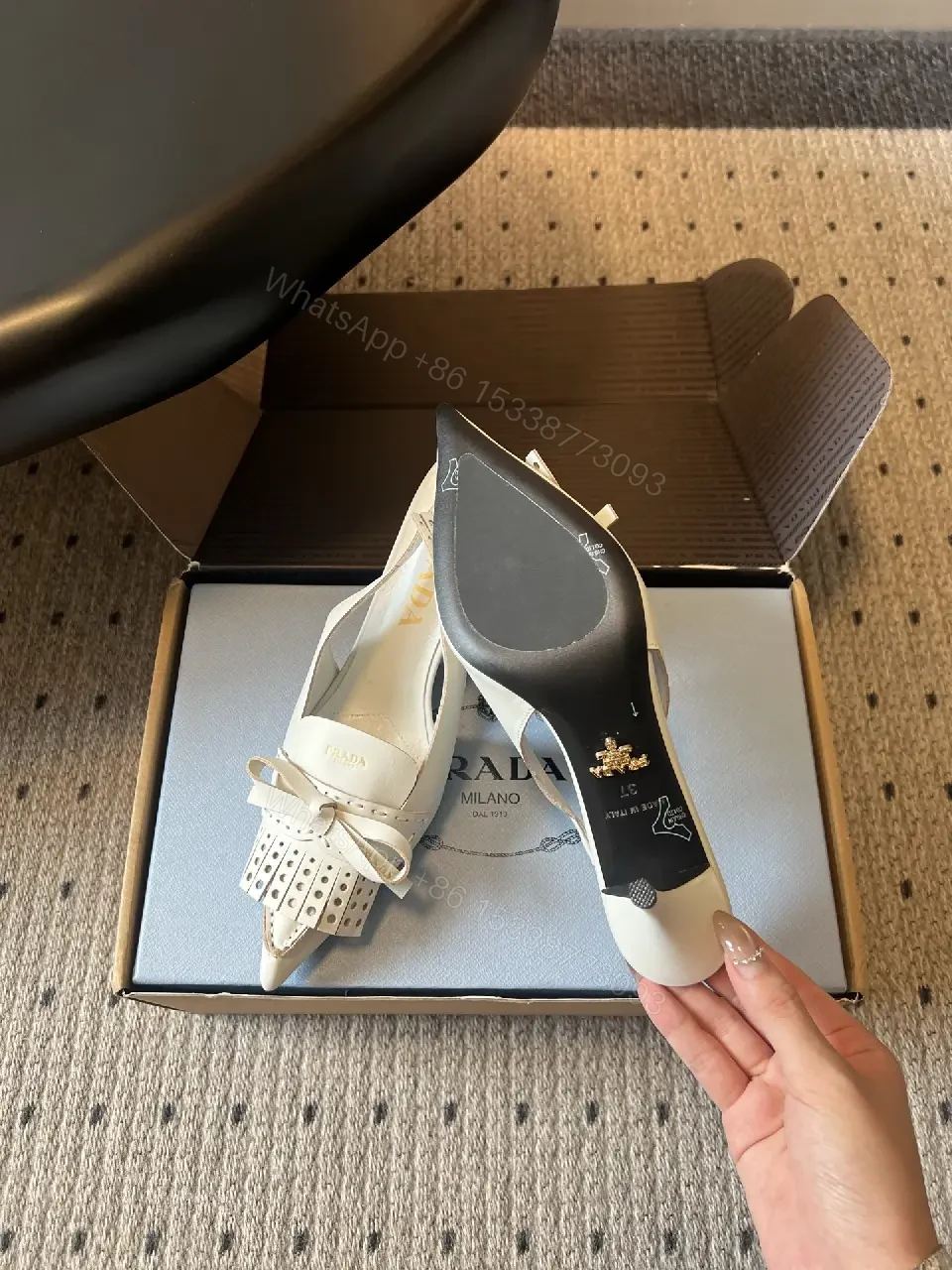 View 6 of White Leather Slingback Heels with Studded Bow – Classic Prada Style