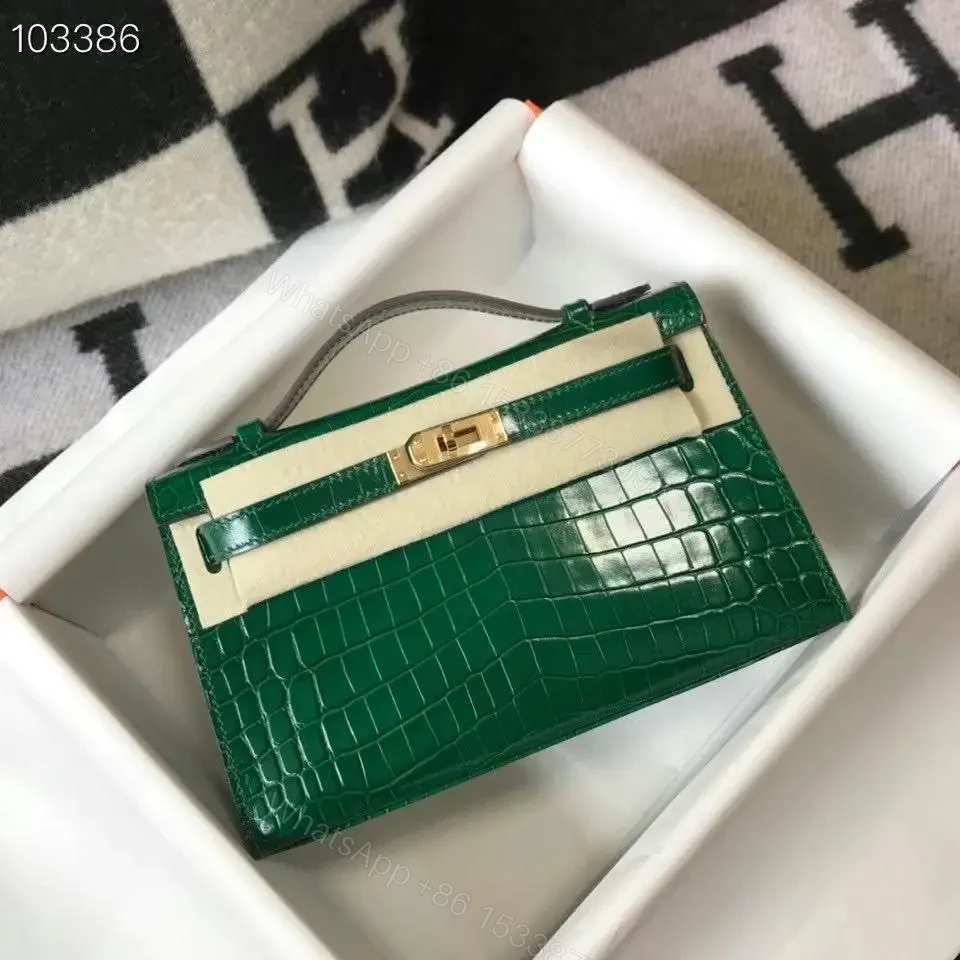 Design Kelly Pochette Bag In Black Embossed Crocodile Leather – Dubai Fashion LUX — view 1