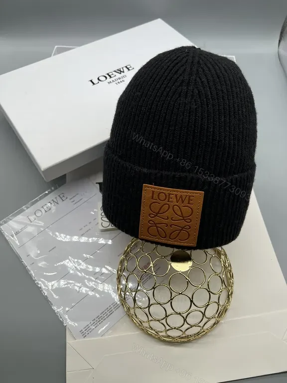 View 7 of Cozy Brown Wool Beanie with Loewe Patch Detail
