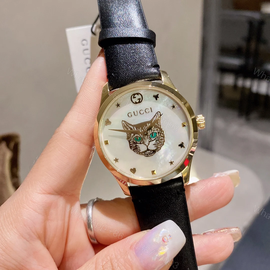 Gucci高仿G-Timeless貓眼女錶貝殼面黑皮錶帶限量風格款 — view 1