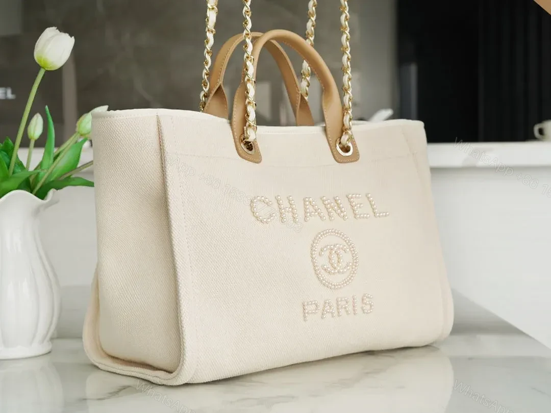 View 6 of CHANEL TOTE BAG 39 ATTACHED PEARL LOGO IN BEIGE CANVAS GOLD HARDWARE
