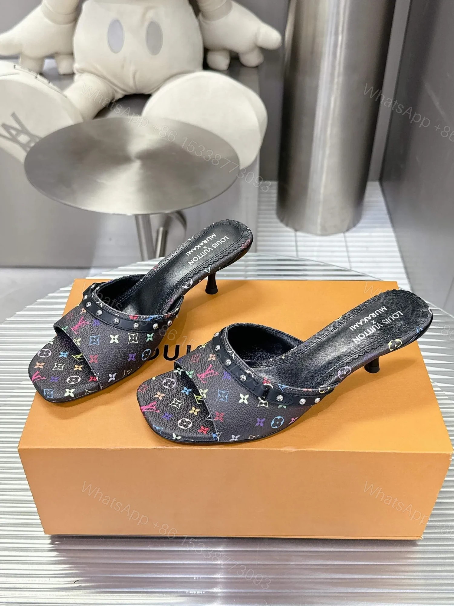 View 5 of LV Women Black Patterned Leather Mules