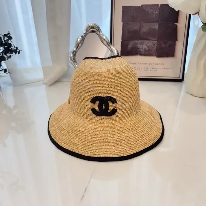 Chic Straw Hat with Logo Accent — Breathable Luxury Hat — view 1
