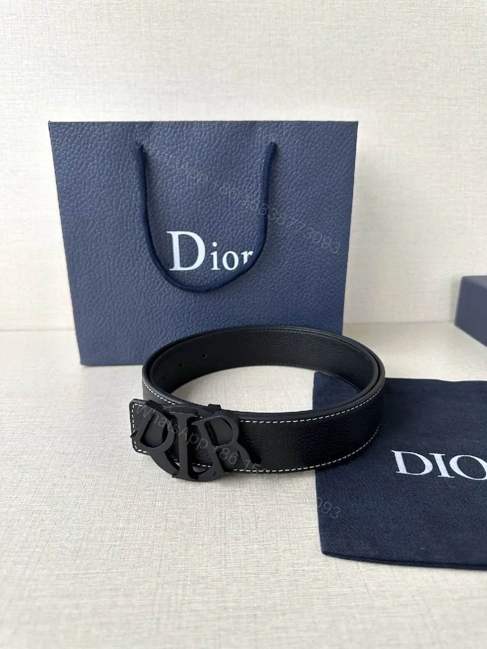 View 5 of Black Leather Belt with Interlock Buckle - Modern Chic Style