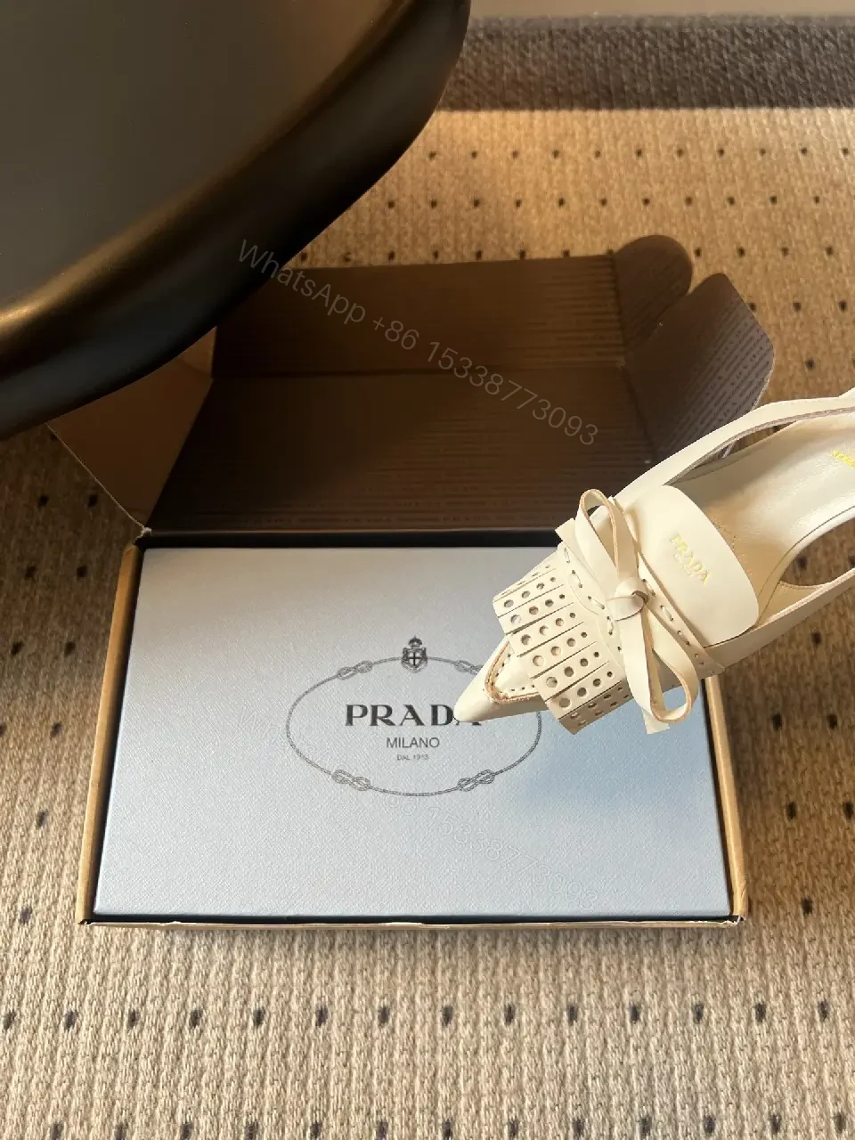 View 7 of White Leather Slingback Heels with Studded Bow – Classic Prada Style