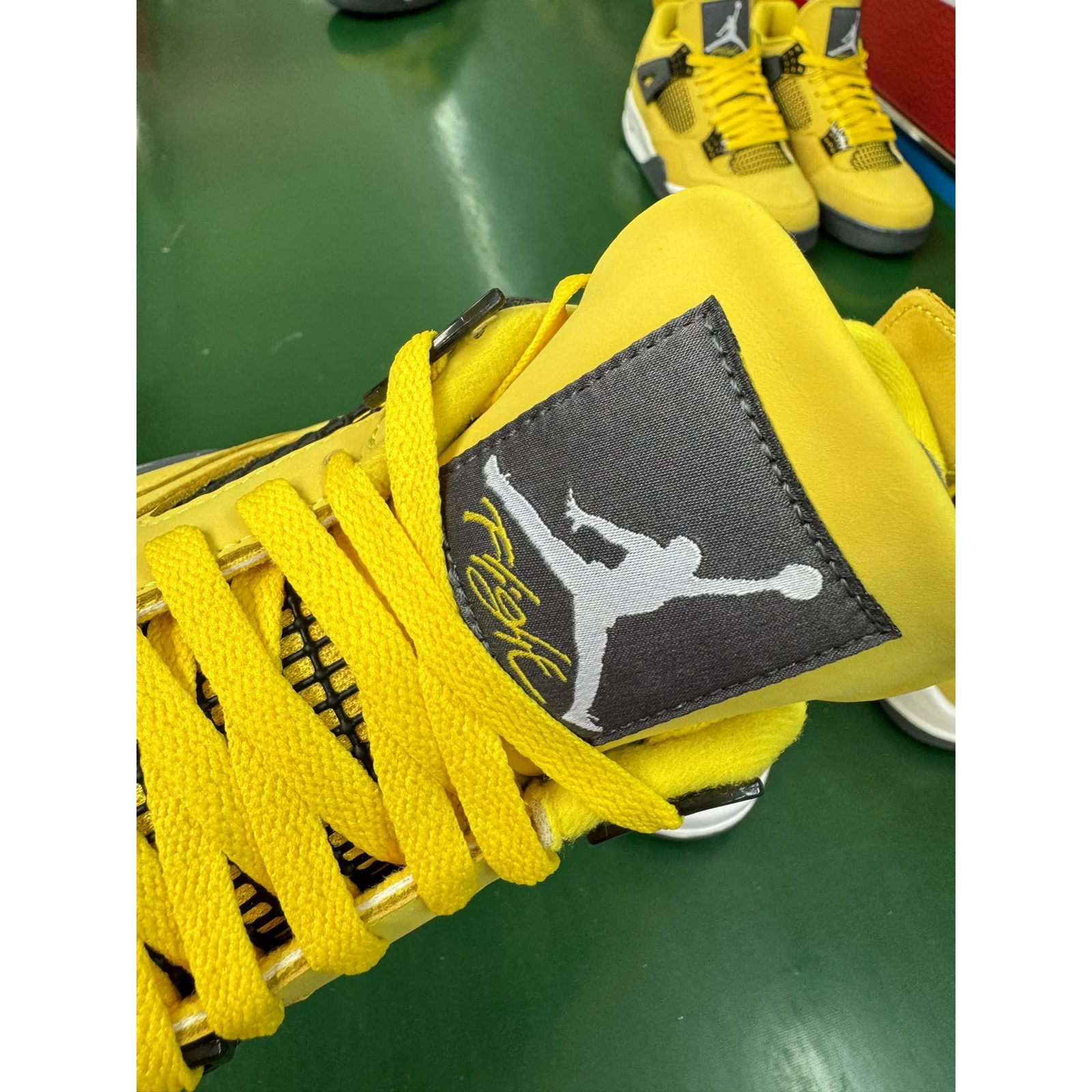 Air Jordan 4 Tour Yellow / Lightning
