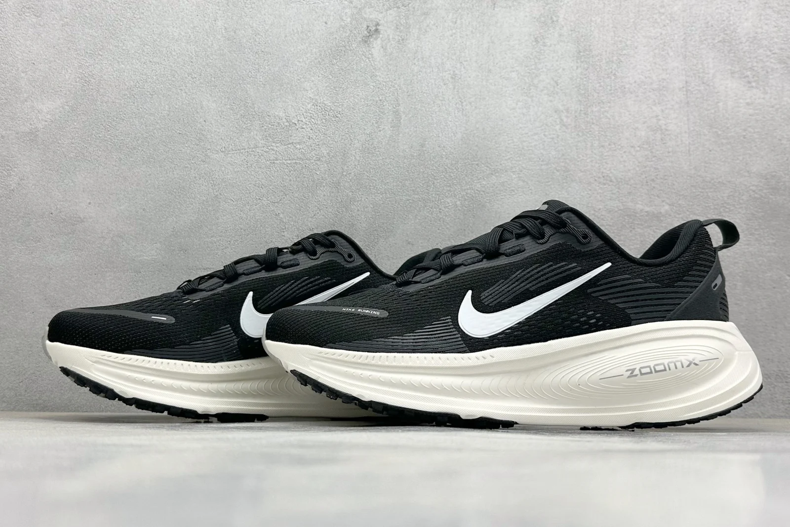 Nike Vomero 18 Men · Black / Coconut Milk / Light Iron Ore / Summit White · HM6803-007