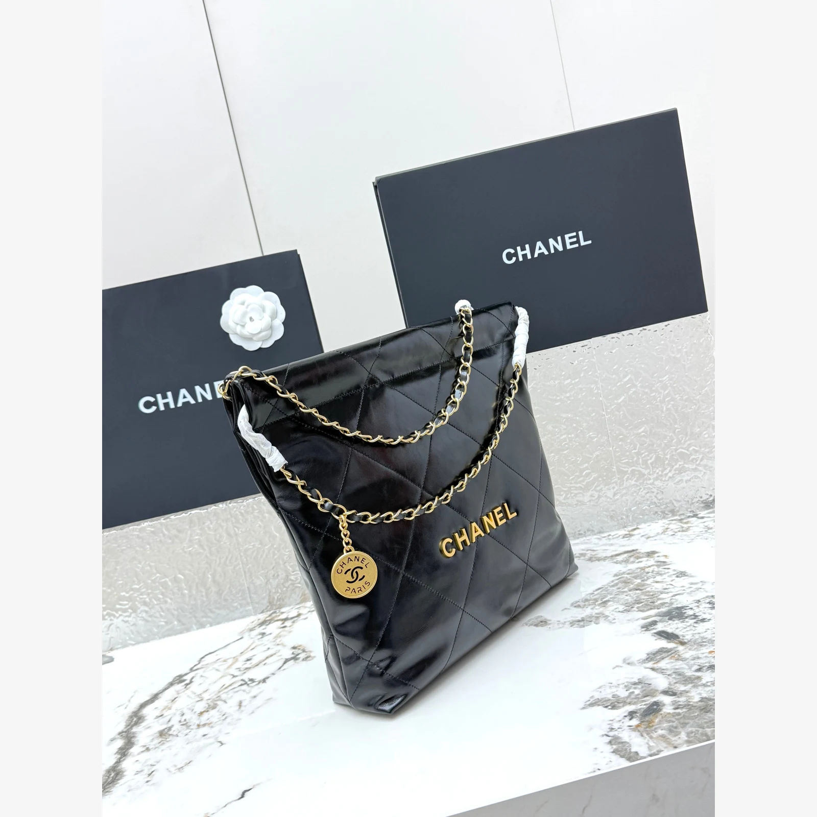 Chanel 22 Small Handbag · Black Shiny Calfskin Black · Shiny Calfskin · Gold-Tone Metal